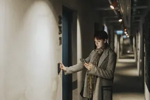 A guest unlocking the studio door using WebLock keypad