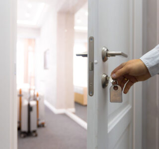 A retro hotel lock with a key